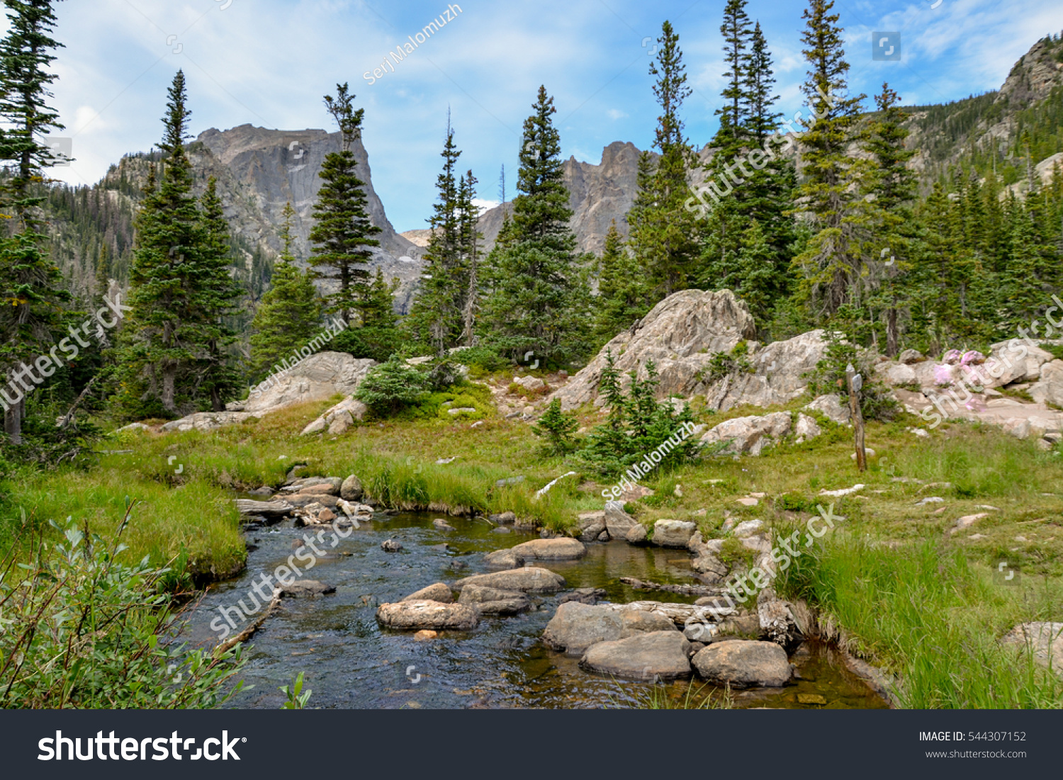 Tyndall creek crossing Emerald Lake trail with Hallett peak in the background
Rocky Mountain National Park, Estes Park, Colorado, United States #544307152
