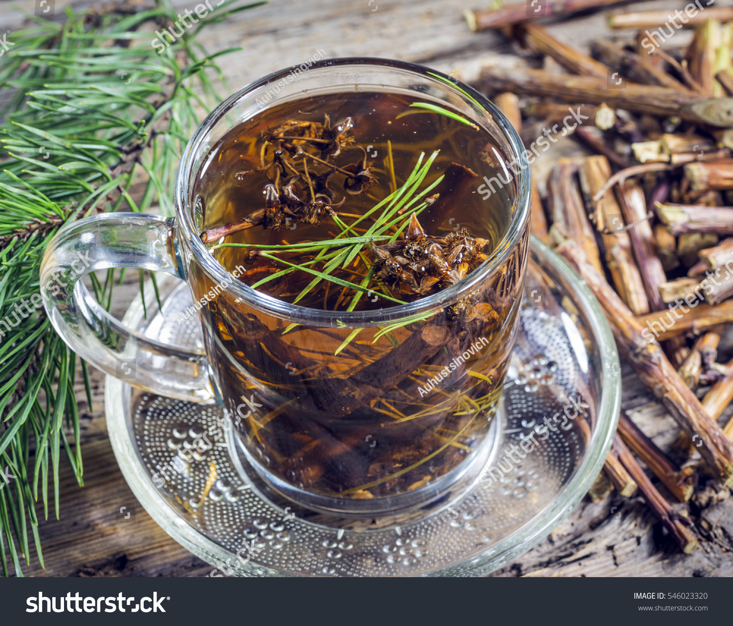 Useful tea from dry branches raspberries and pine needles #546023320