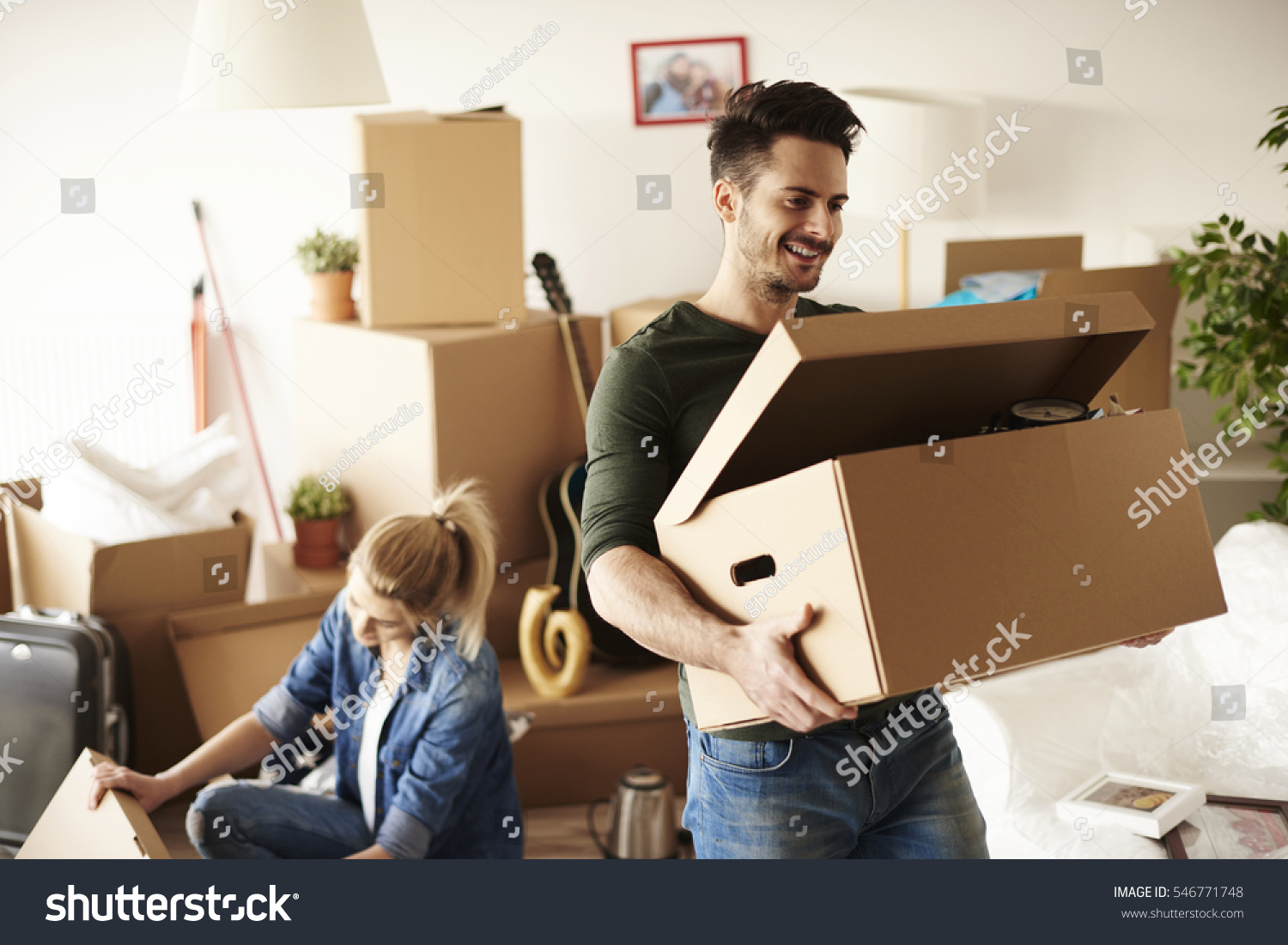 Young couple moving in to house  #546771748