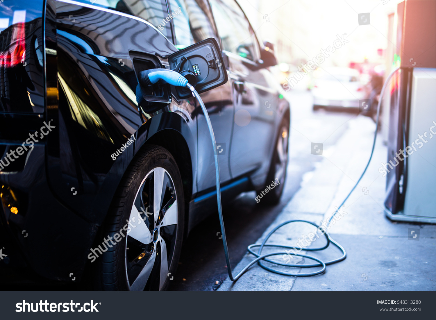 Charging modern electric car on the street which are the future of the Automobile #548313280