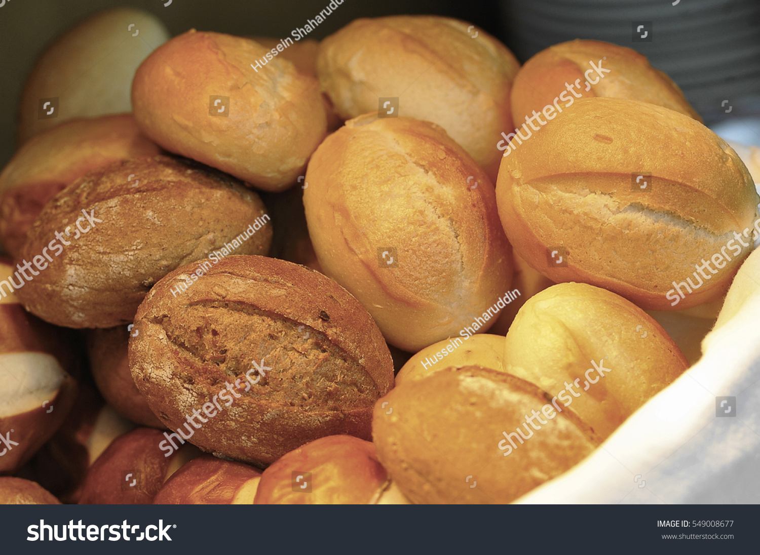 Assorted bread in a basket #549008677