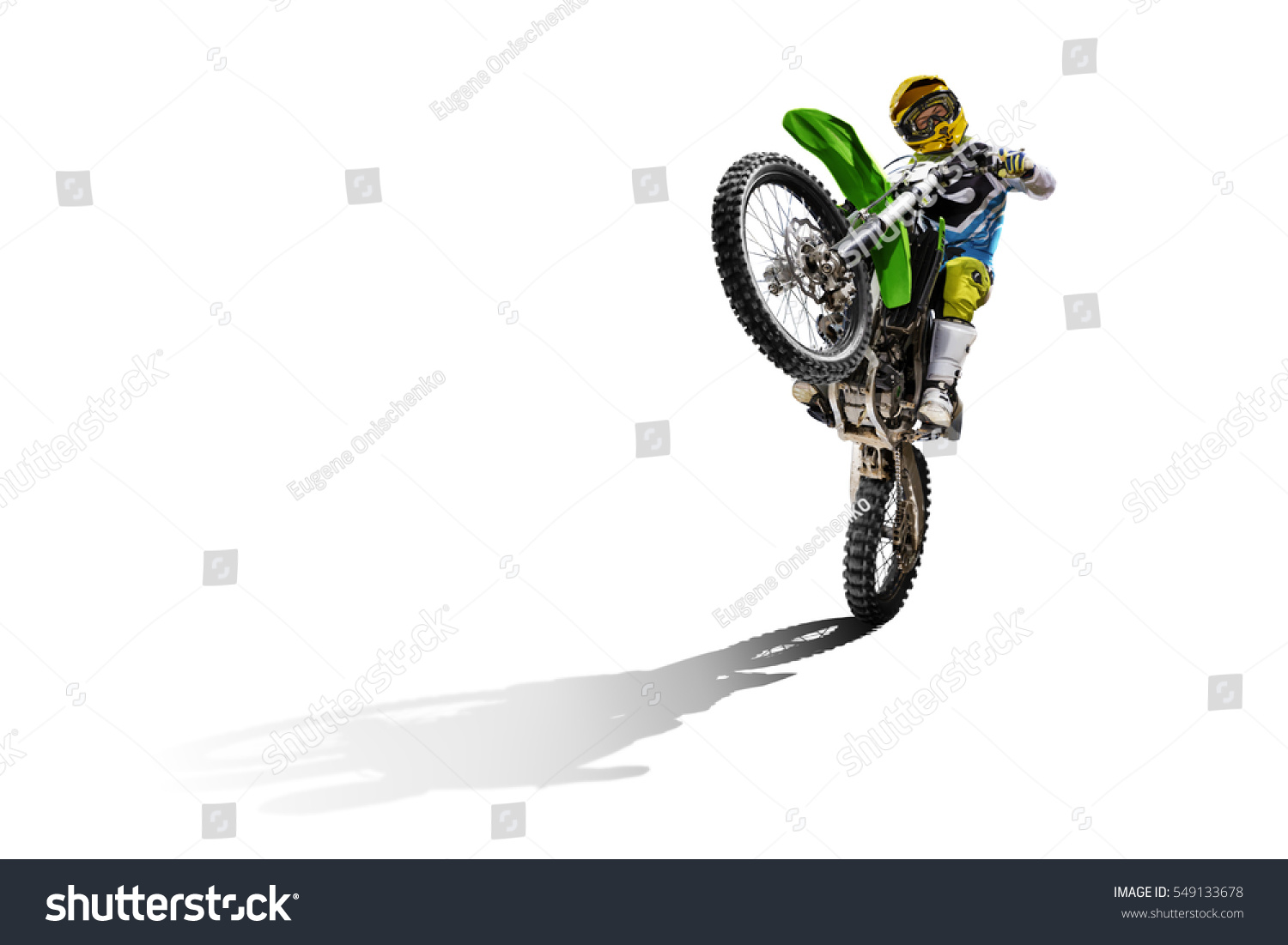 Dirt bike and rider isolated on white #549133678