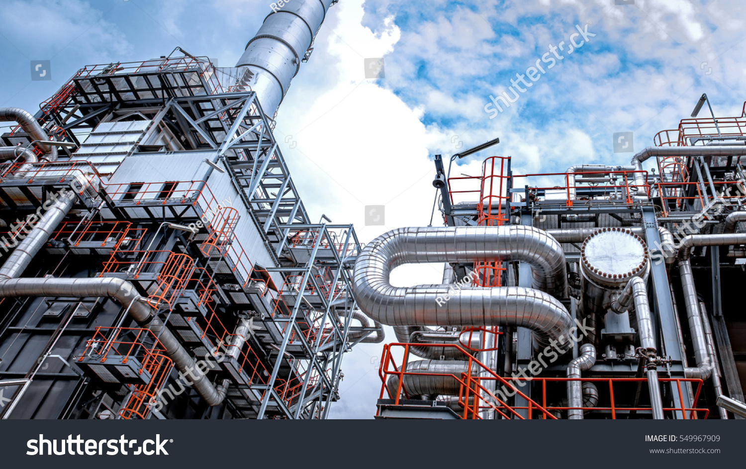 Close up Industrial view at oil refinery plant form industry zone with sunrise and cloudy sky #549967909