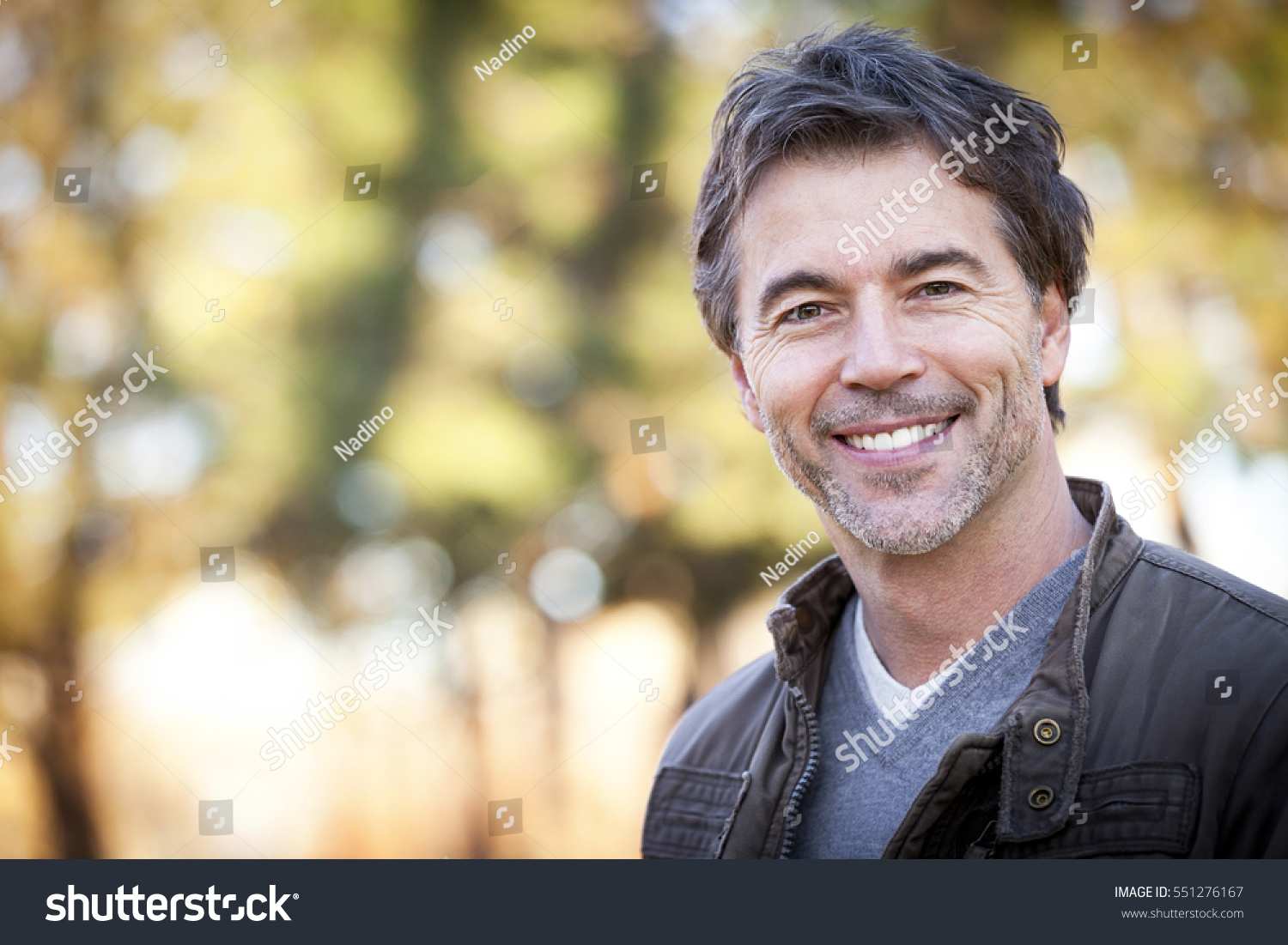 Handsome Mature Happy Man Smiling At The Camera.Outside. #551276167
