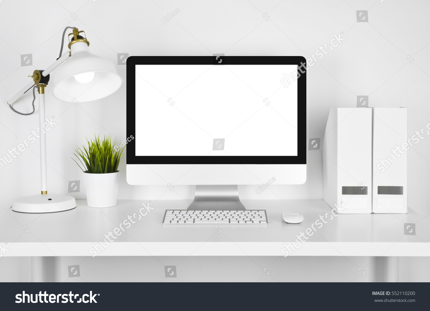 Blank screen computer, lamp and table folder over white background #552110200
