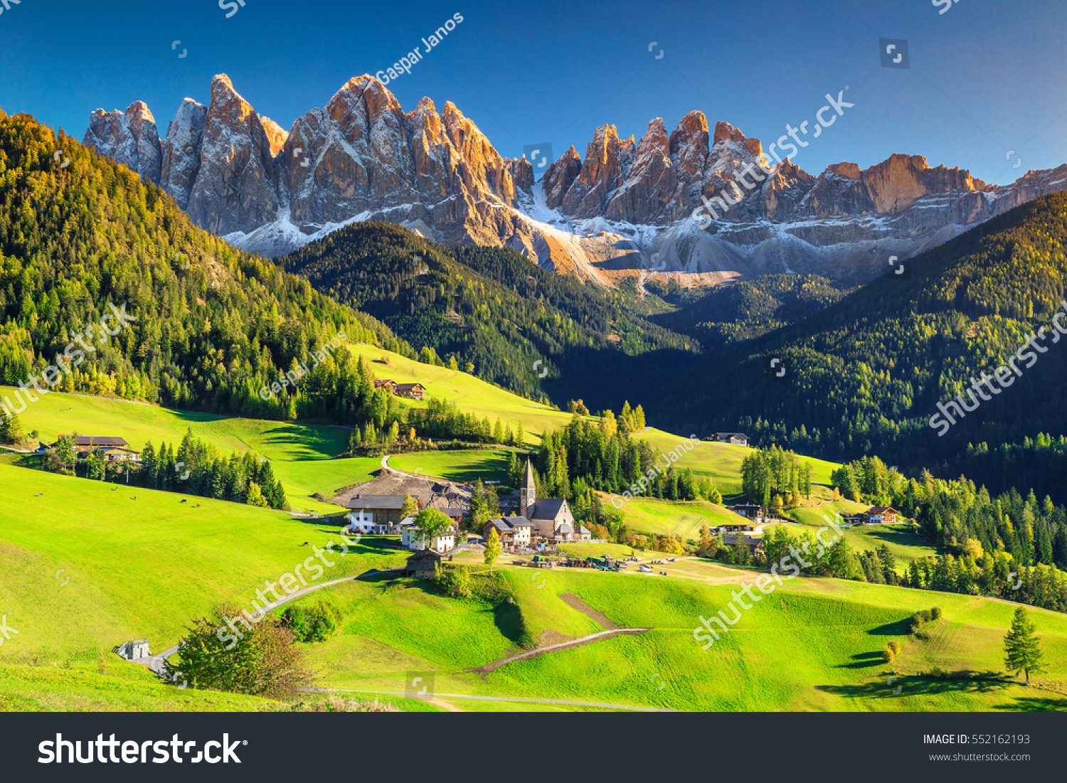 Famous best alpine place of the world, Santa Maddalena village with magical Dolomites mountains in background, Val di Funes valley, Trentino Alto Adige region, Italy, Europe #552162193