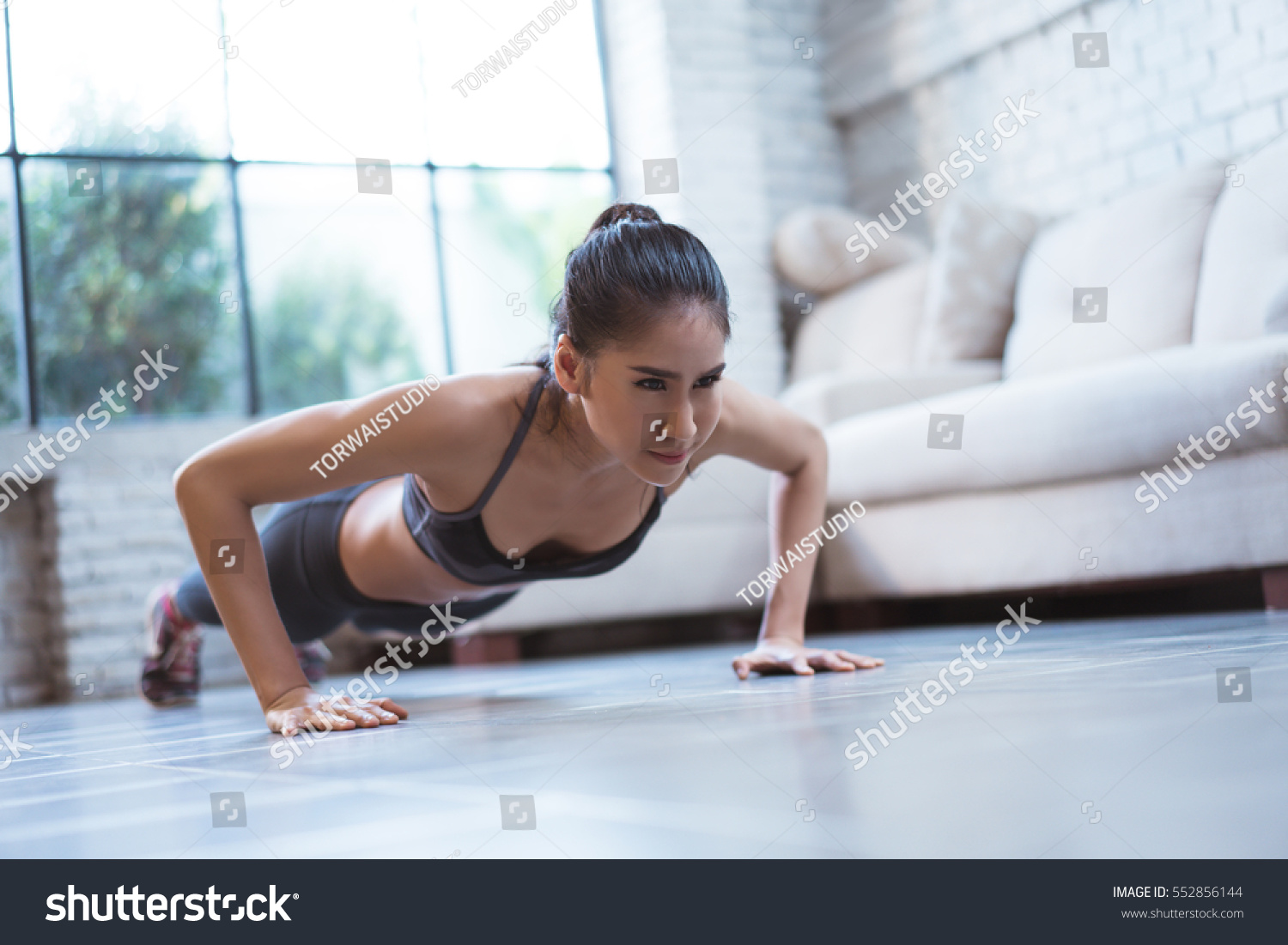 Asian women exercise indoor at home she is acted "push up" #552856144