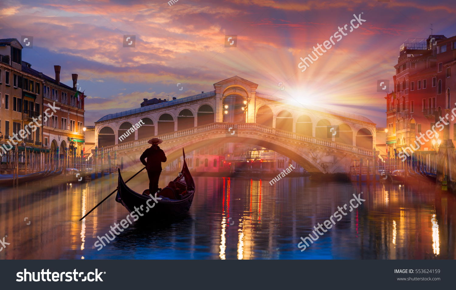 Gondola near Rialto Bridge in Venice, Italy #553624159