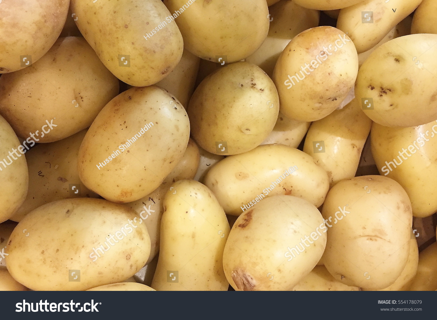 Potatoes at a market #554178079