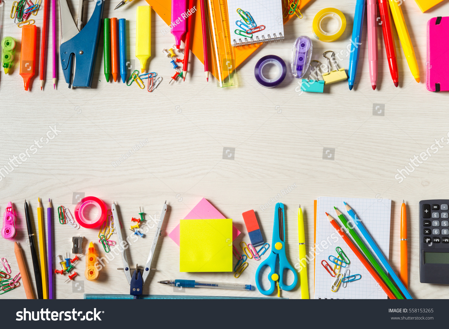 School stationery supplies, wide copy-space in the centre #558153265