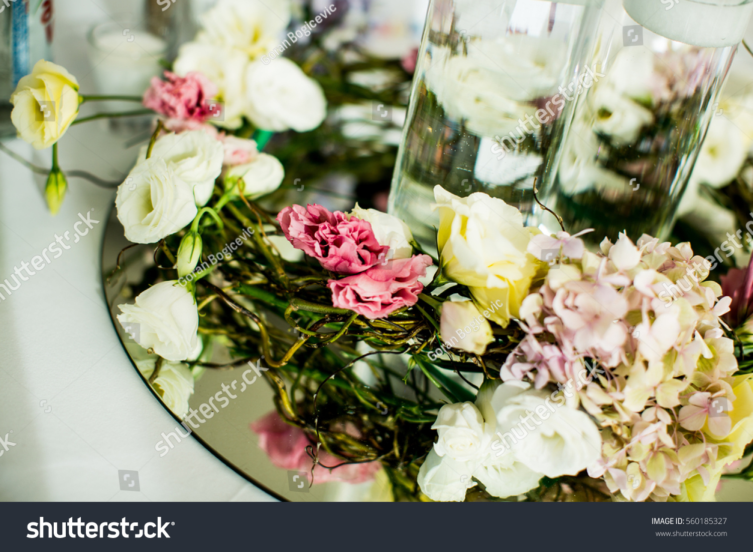 Detail of flower wedding decoration on the table #560185327