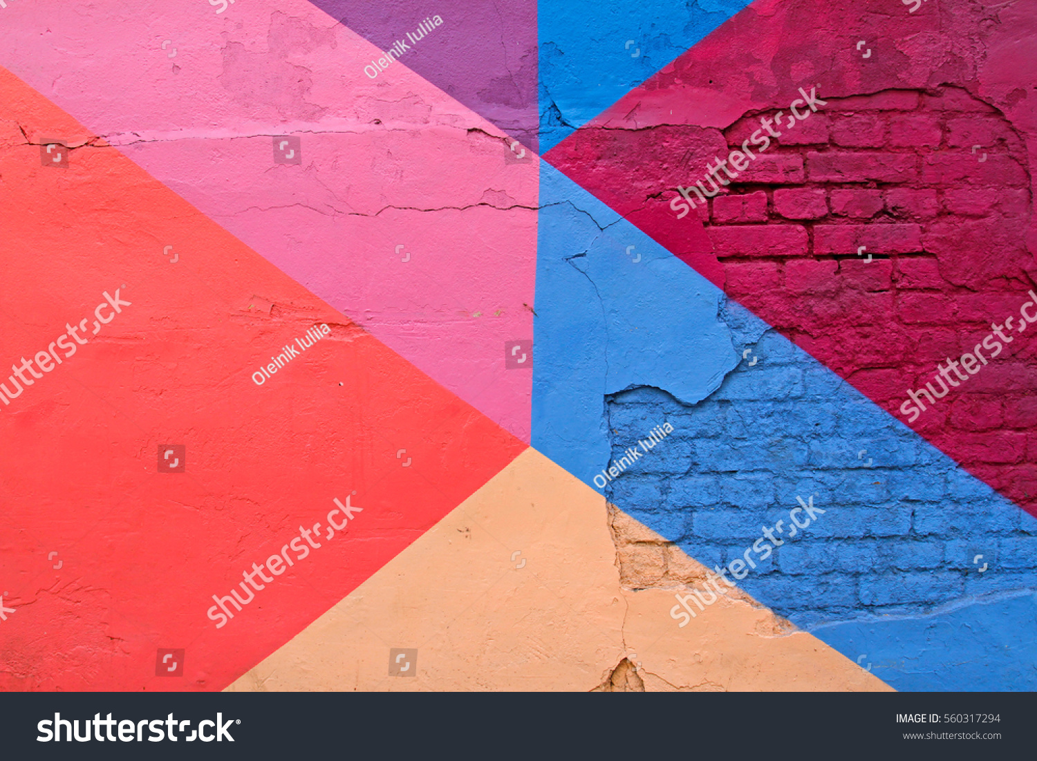 Colorful (purple, blue pink and beige) brick wall as background, texture #560317294