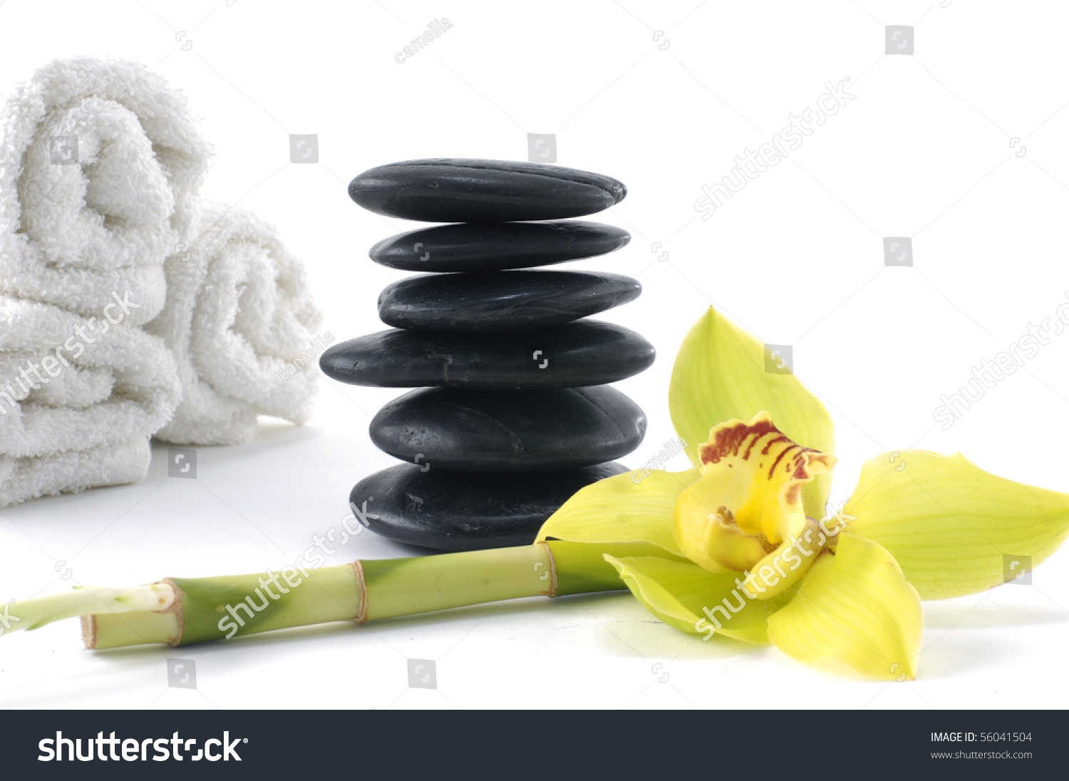 spa concept with yellow orchid and stones with roller towel #56041504