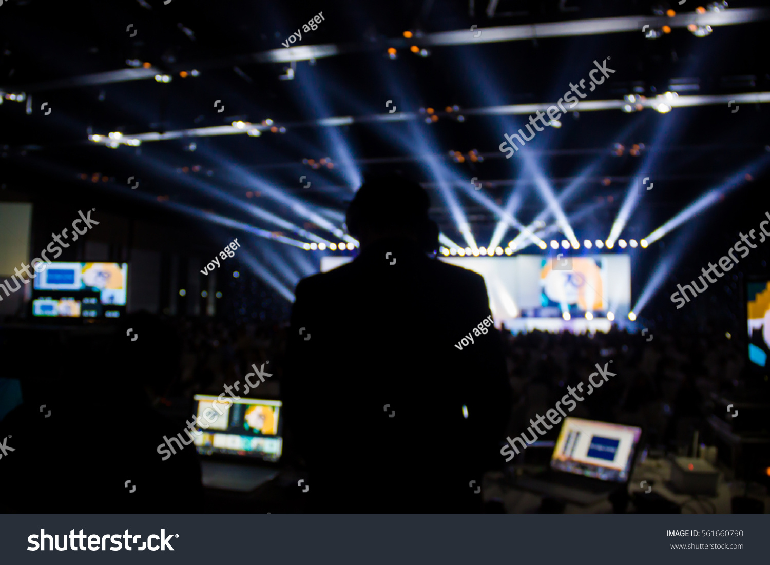 Silhouette of worker control, sound system and lighting in concert. #561660790