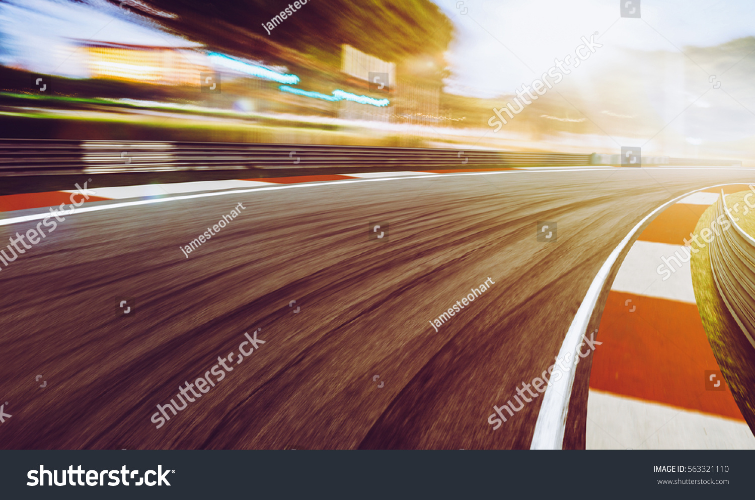 Motion blurred racetrack,sunset scene #563321110