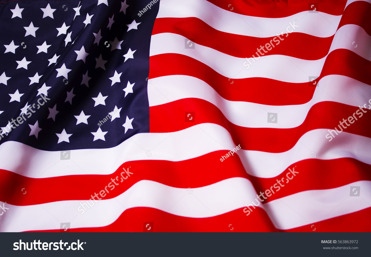 Beautifully waving star and striped American flag #563863972