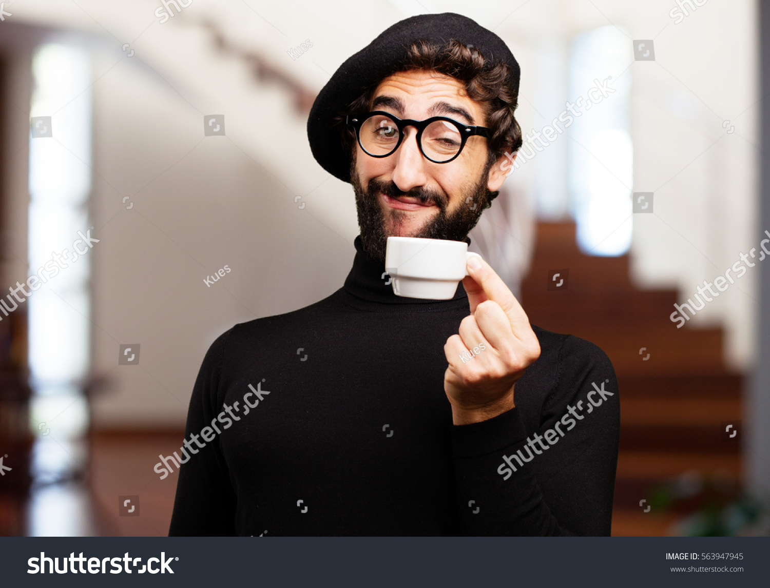 young french artist with a coffee #563947945