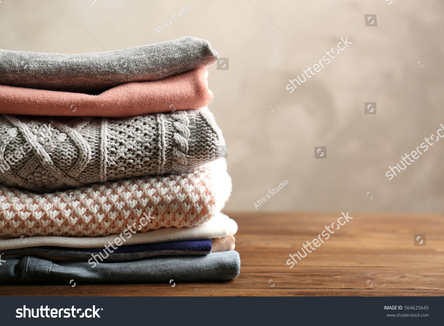 Pile of clothes on table
