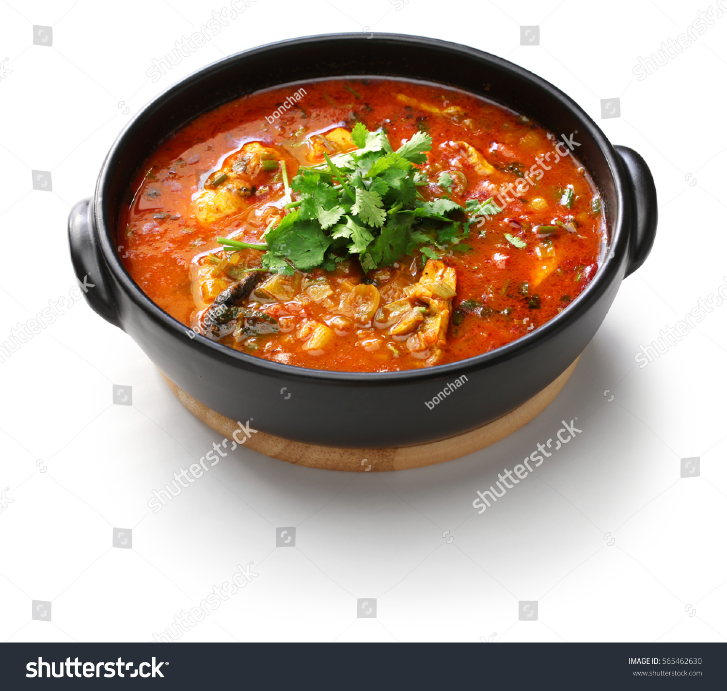 moqueca capixaba, brazilian fish stew isolated on white background #565462630