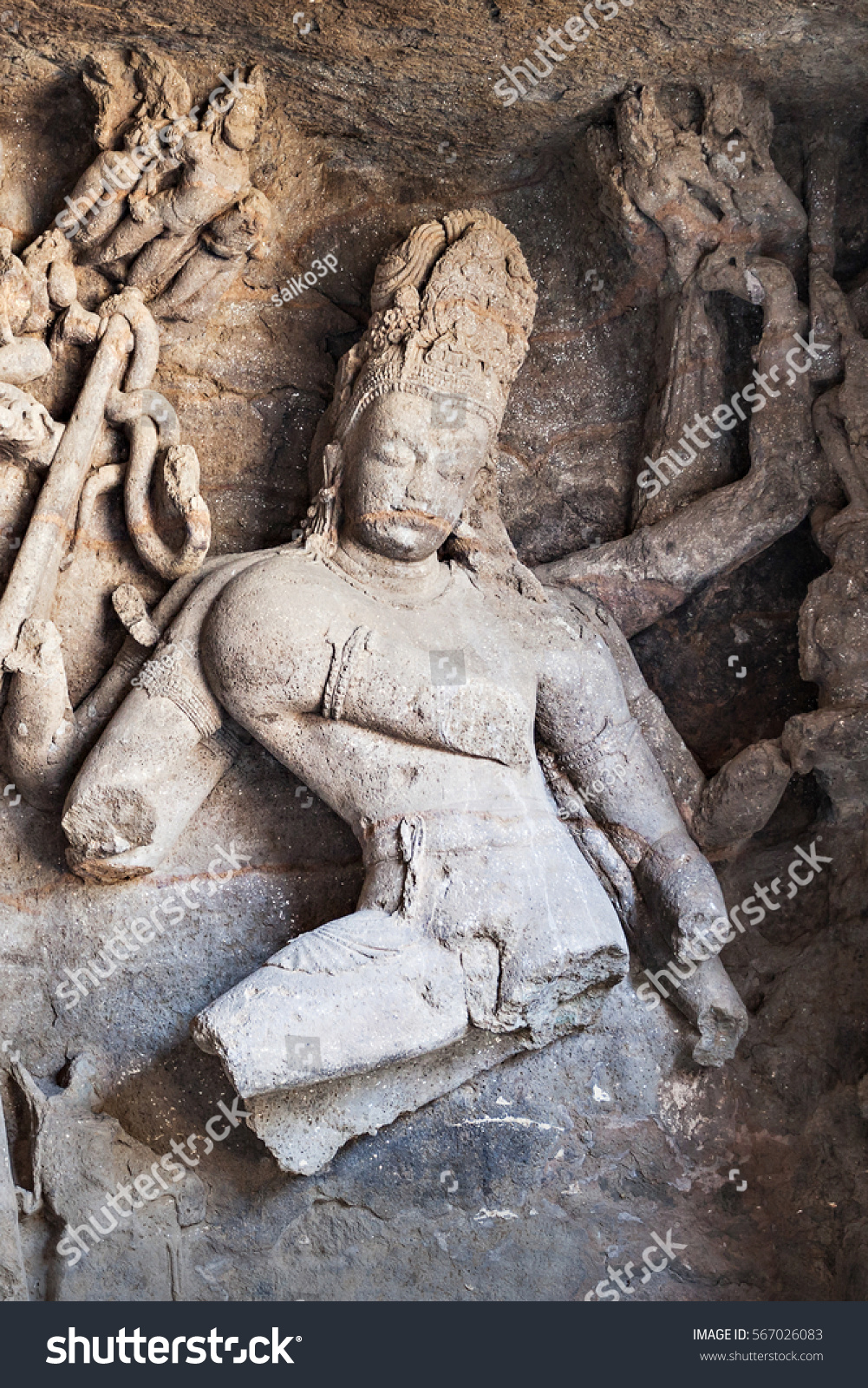 Shiva as Nataraja sculpture inside Elephanta Island caves near Mumbai in Maharashtra state, India #567026083