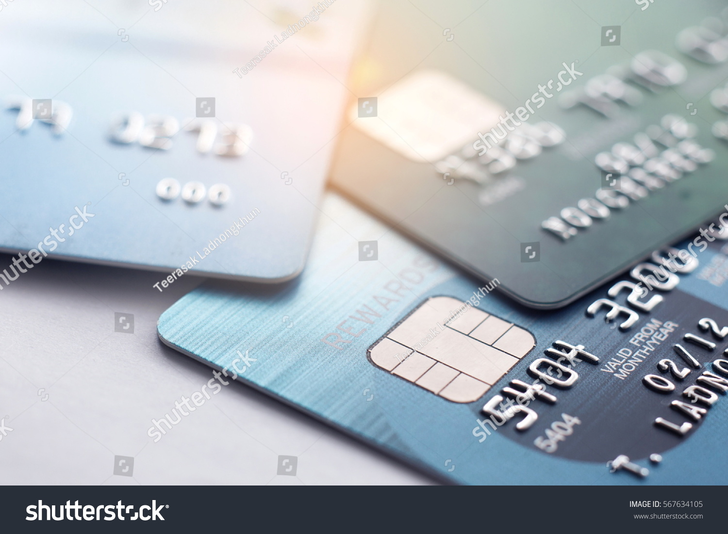 Credit card close up shot with selective focus for background. #567634105