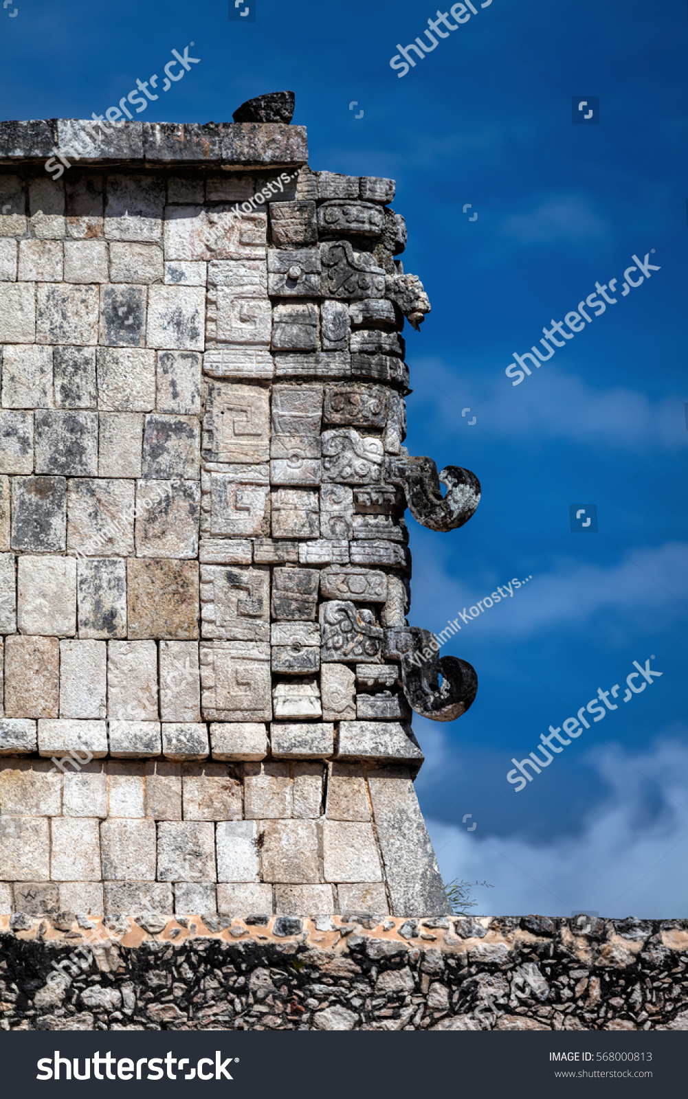 Three-dimensional masks at the corner of the Thousand Warriors temple in Chichen Itza, believed to be the Ancient Mayan god of rain and lightning Chac. #568000813