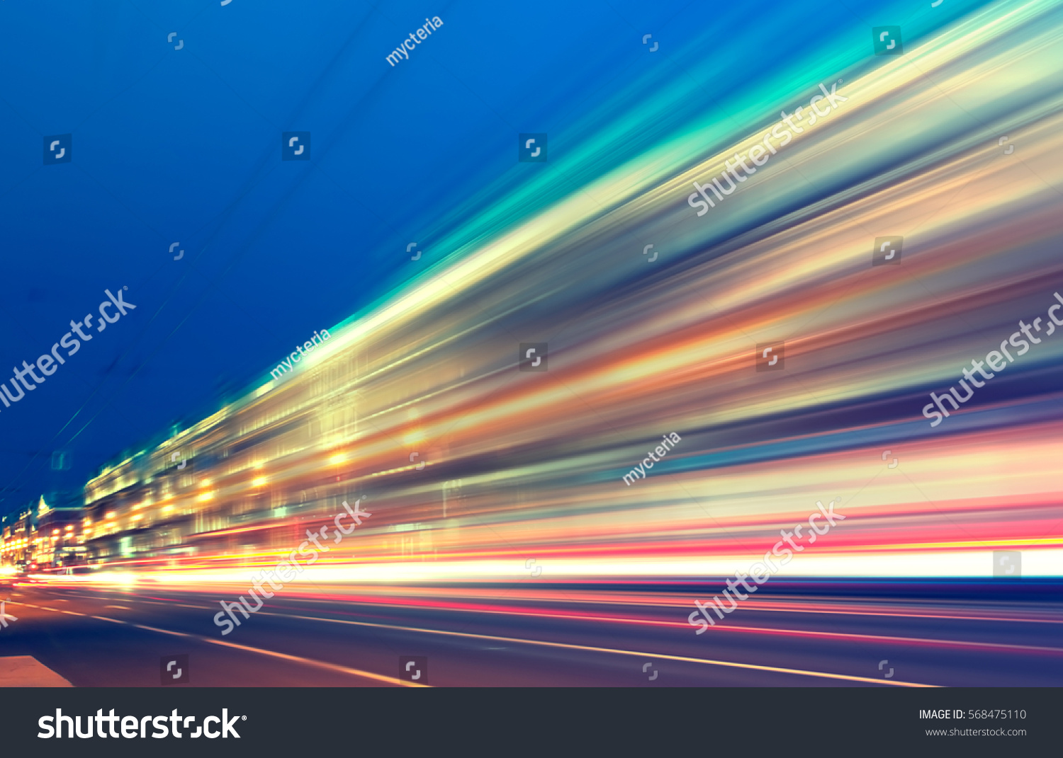 abstract image of blur motion of cars on the city road at night #568475110