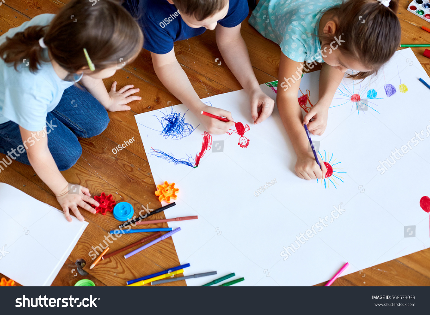 Children Drawing Together #568573039