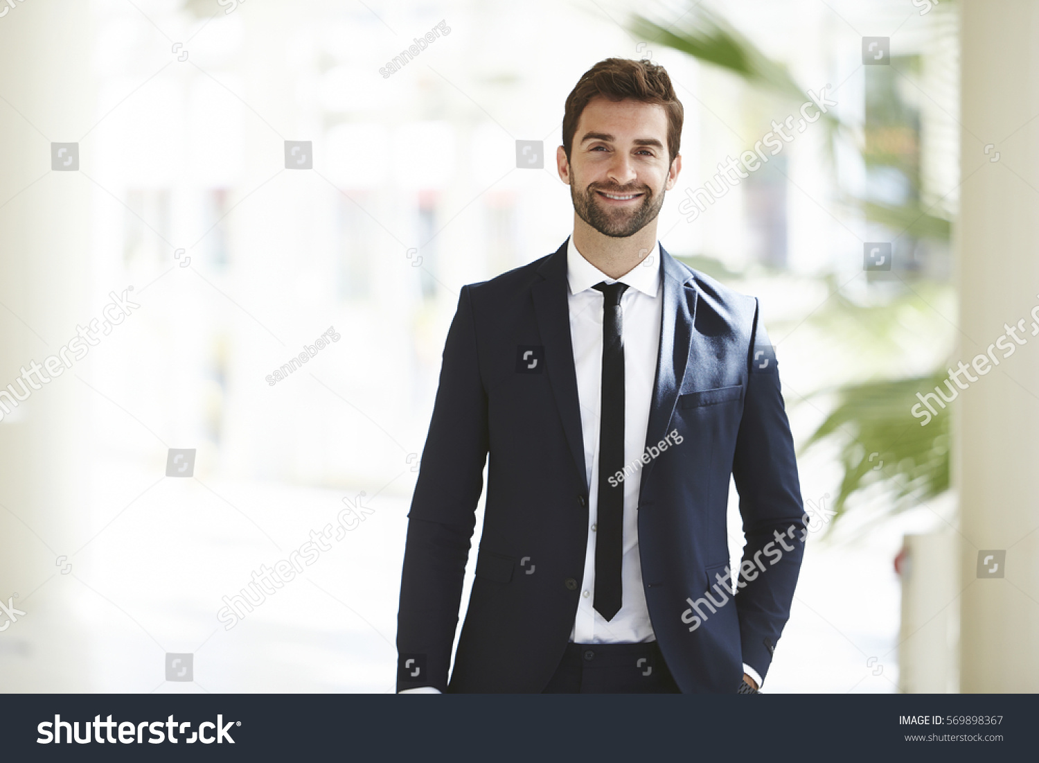Smartly dressed businessman, smiling #569898367