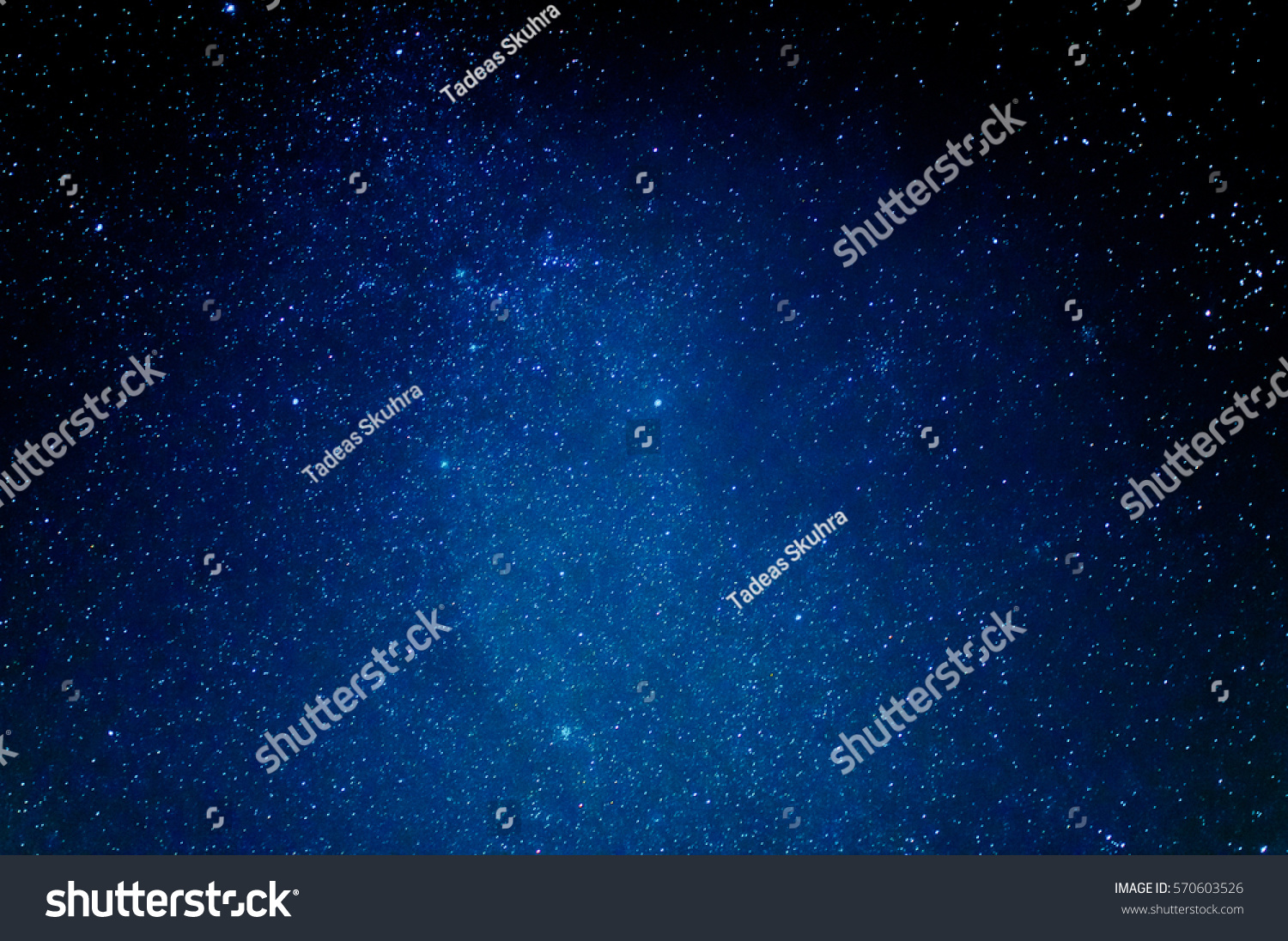 Beautiful scenery of blue night sky with stars. Star trails #570603526