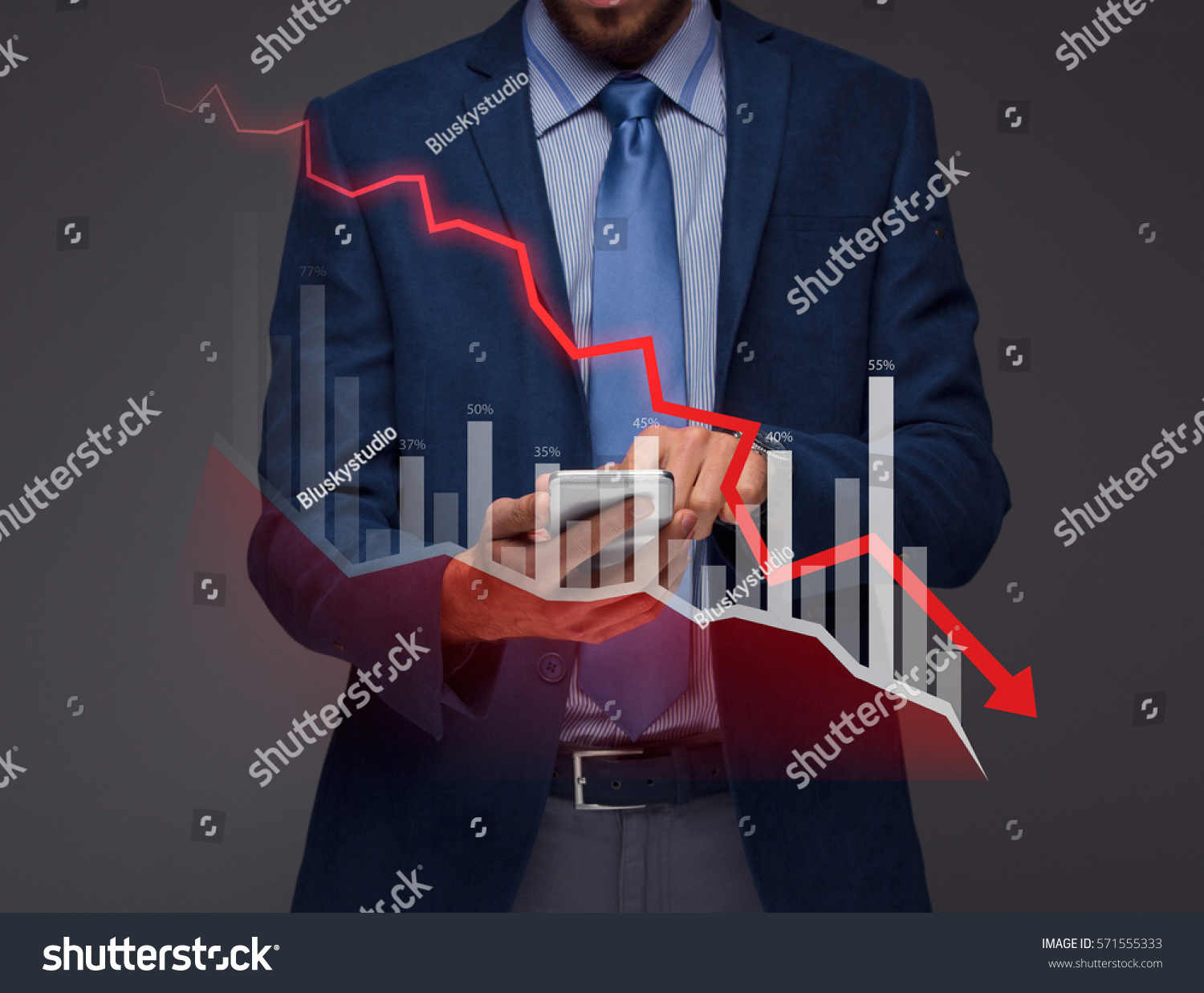Businessman with chart in the fall, economy going down. #571555333