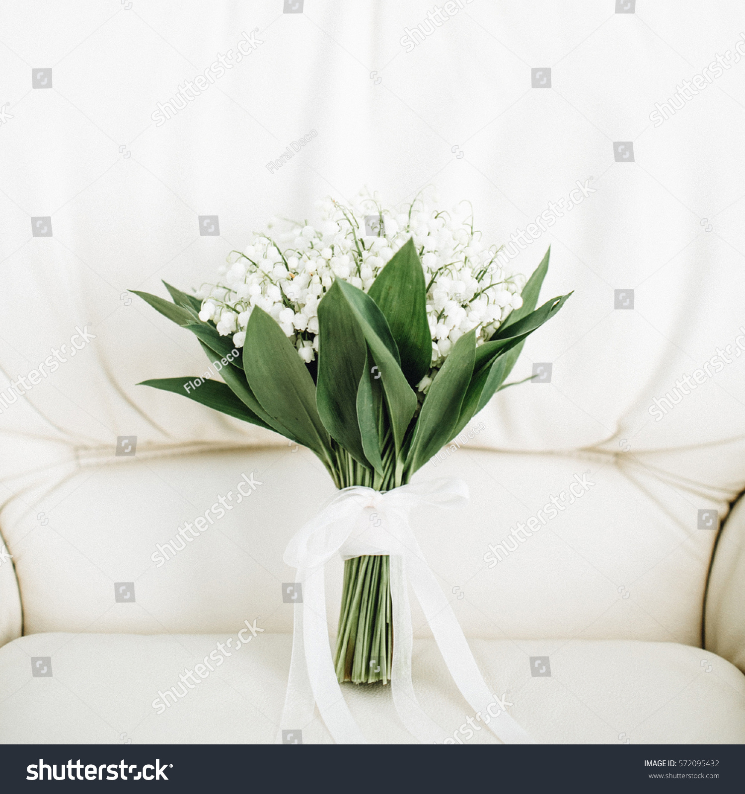 Beauty wedding bouquet of lilies of the valley #572095432
