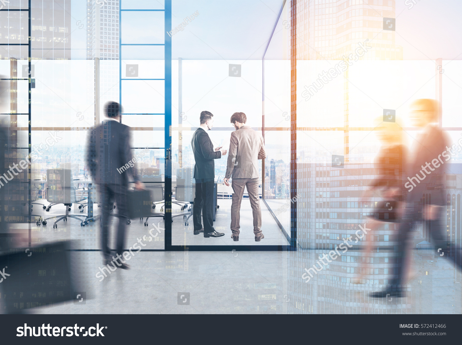 Rear view of people in a meeting room with glass walls. Reception counter is to the right of it. 3d rendering. Toned image. Double exposure. #572412466