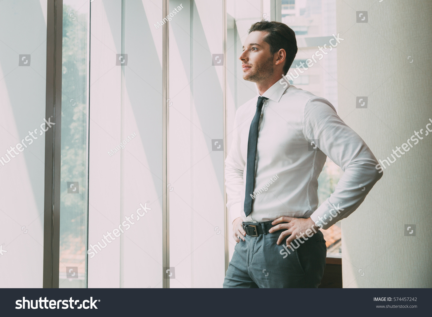 Portrait of Businessman at Window 4 #574457242