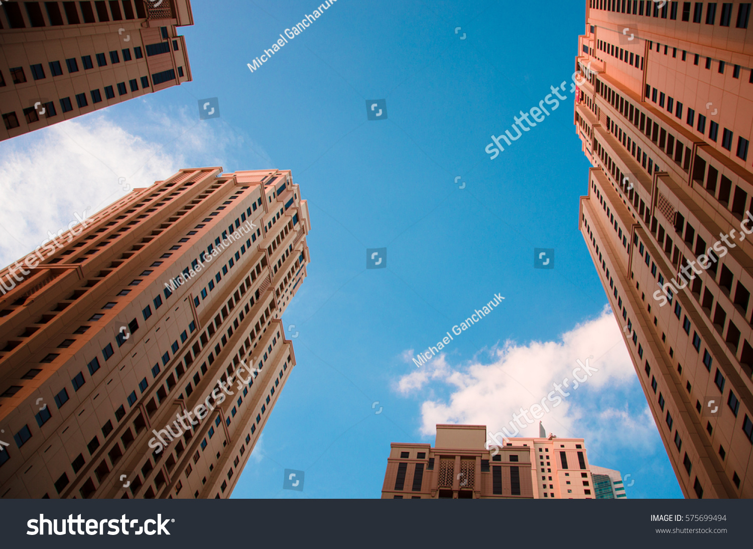 Skyscrapers close to the Marina beach, Jumeirah Lakes Towers, Dubai, UAE. #575699494