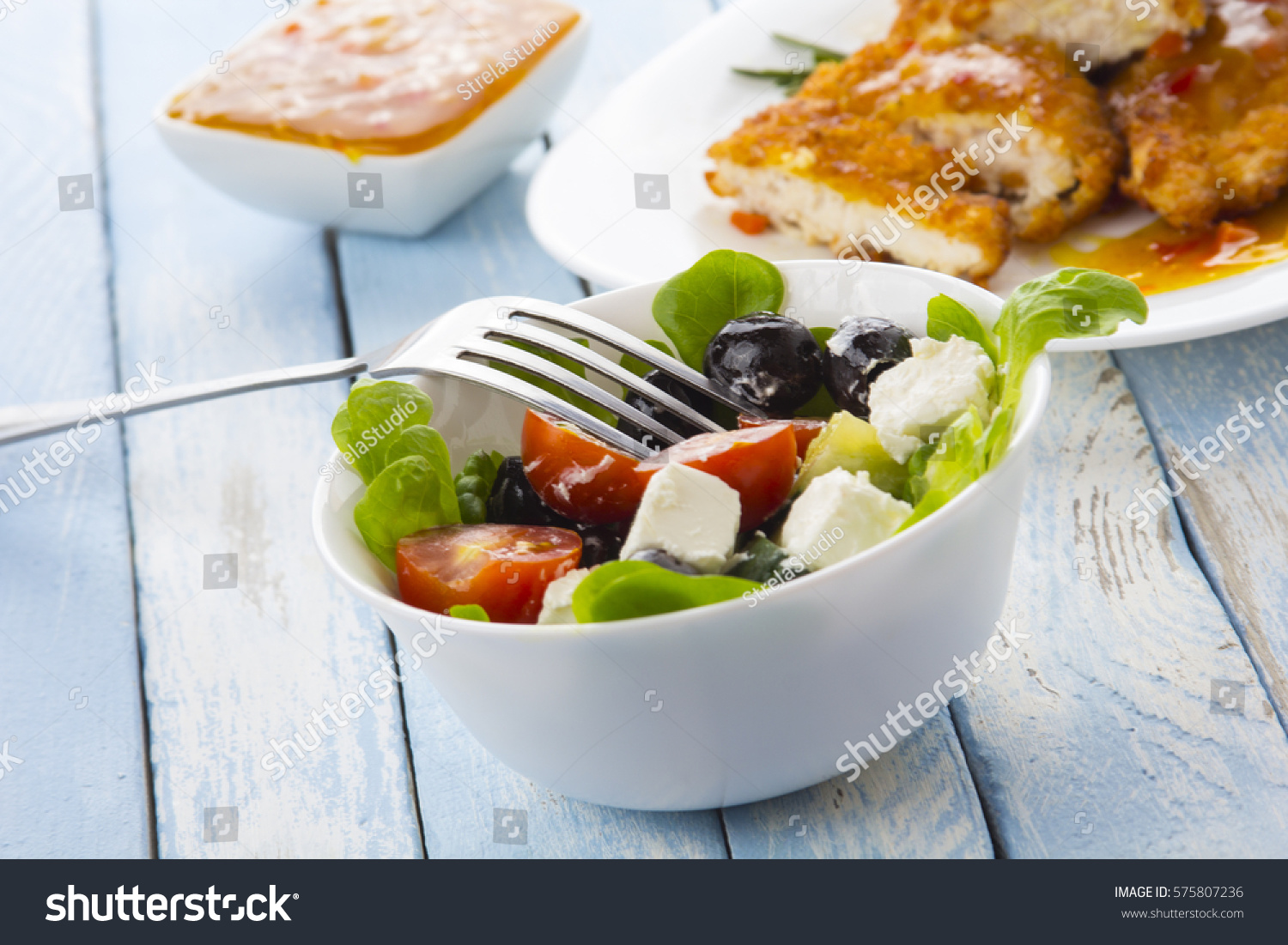 chicken meat Greek salad kitchen food blue wooden background #575807236