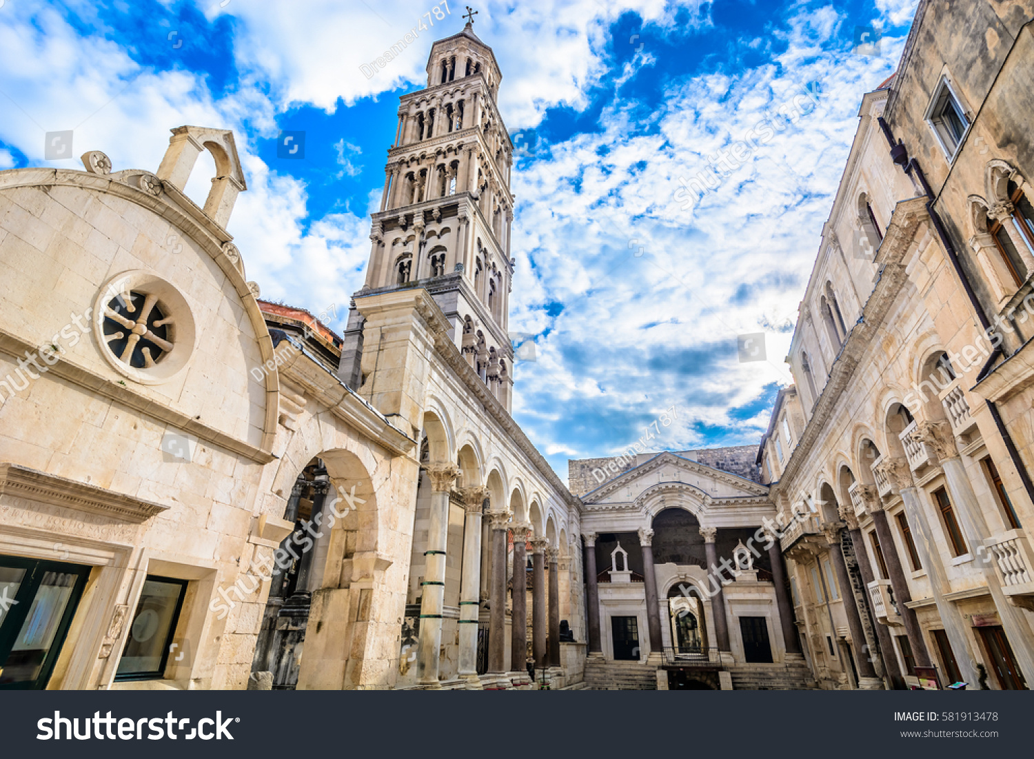 Marble ancient roman architecture in city center of town Split, view at square Peristil in front of cathedral Saint Domnius and  bell tower landmarks, Croatia. / Selective focus. #581913478