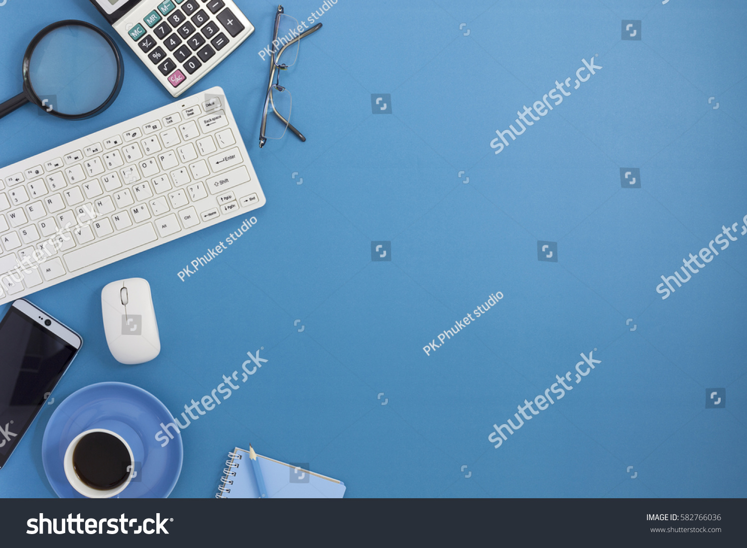 Office desk table of Business workplace and business objects on blue background.Business background concept Copy space #582766036