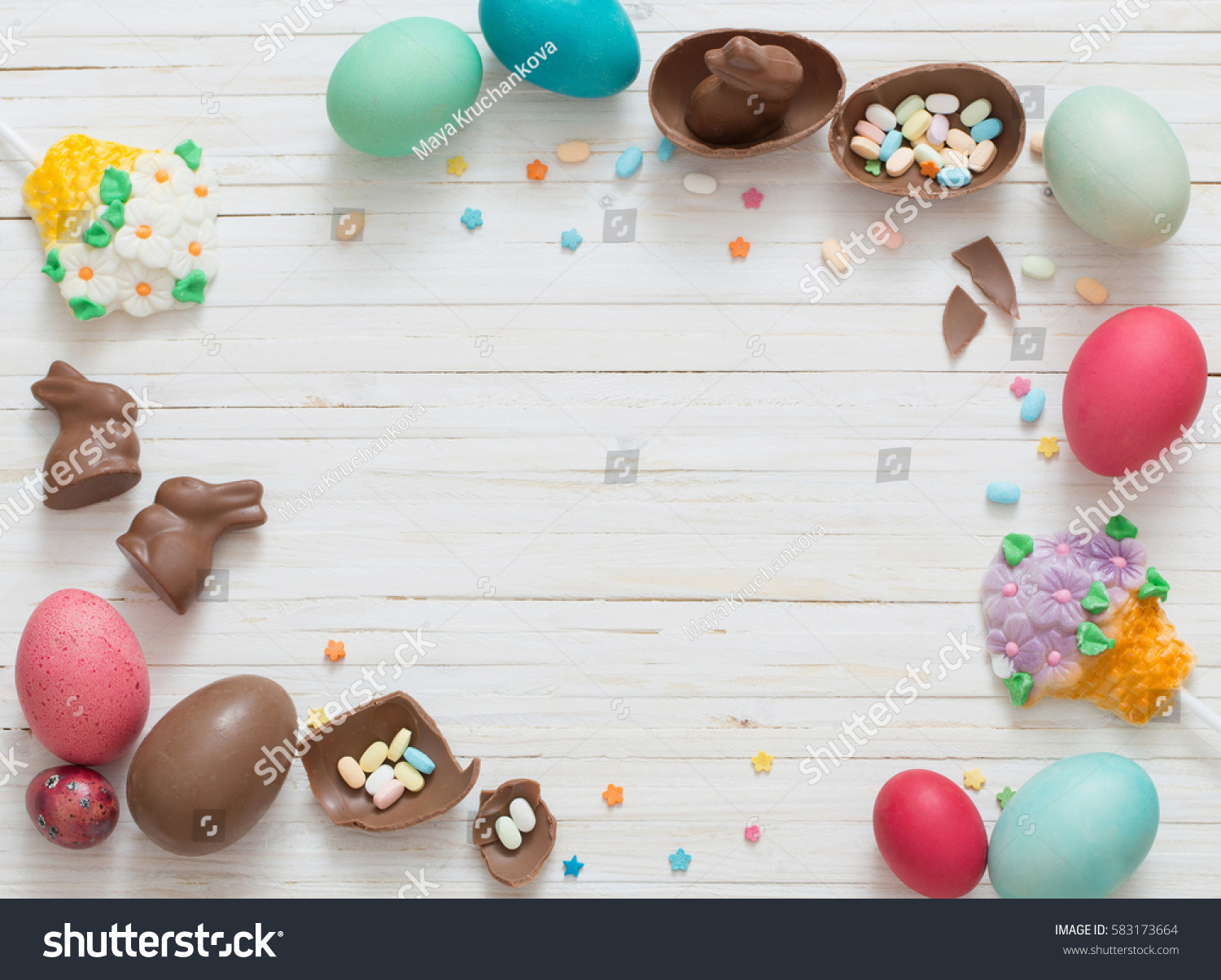 Easter eggs on a white wooden background #583173664
