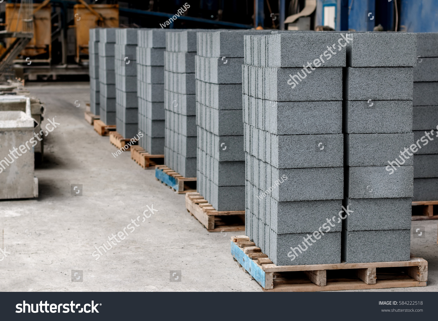 Concrete blocks on wooden pallets before loading #584222518