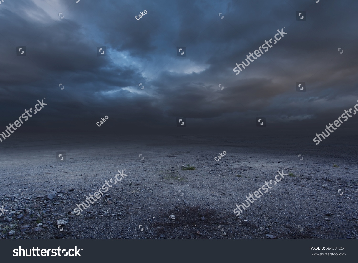 Surreal gravel dark background with dramatic sky #584581054
