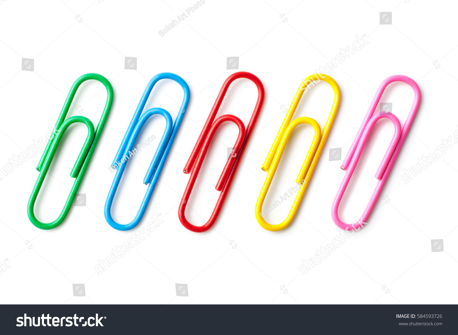 Colored paper clips close-up on a white background #584593726