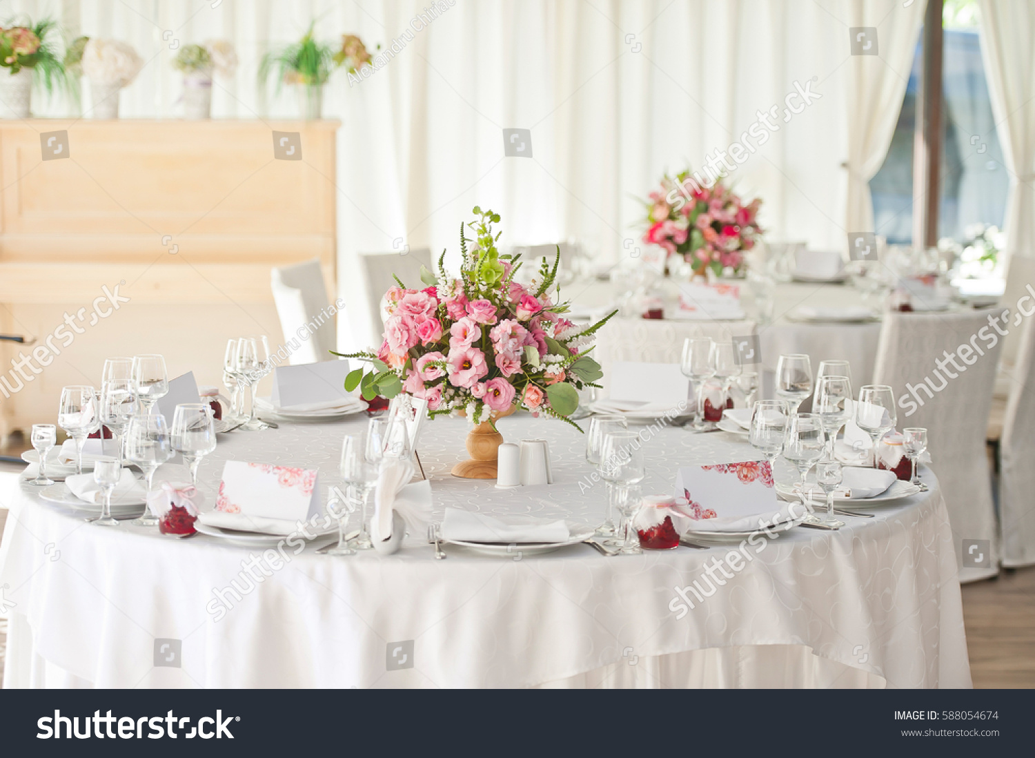 Beautifully decorated tables for guests with decorations #588054674