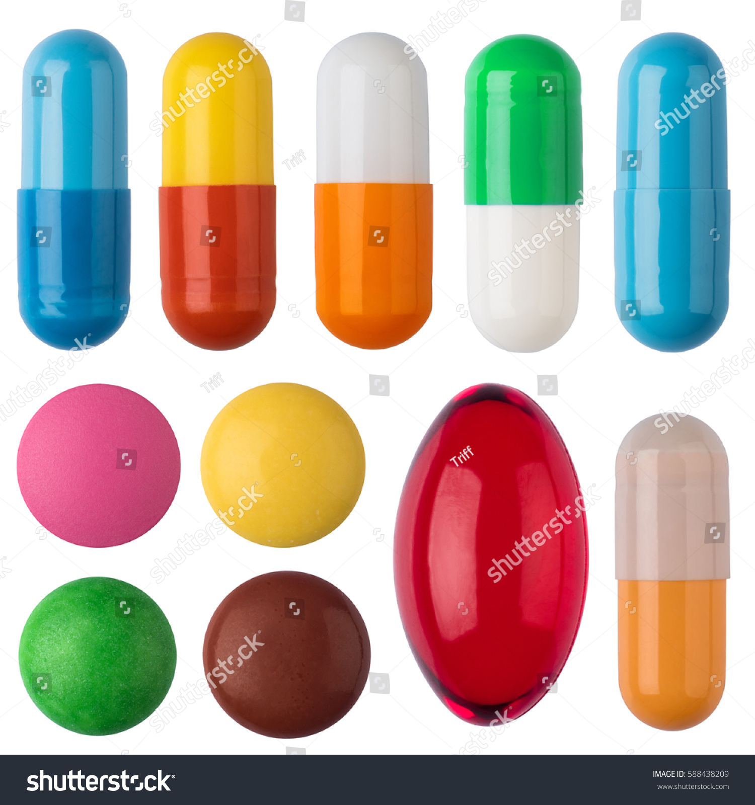 Many colorful pills and tablets isolated on white. #588438209