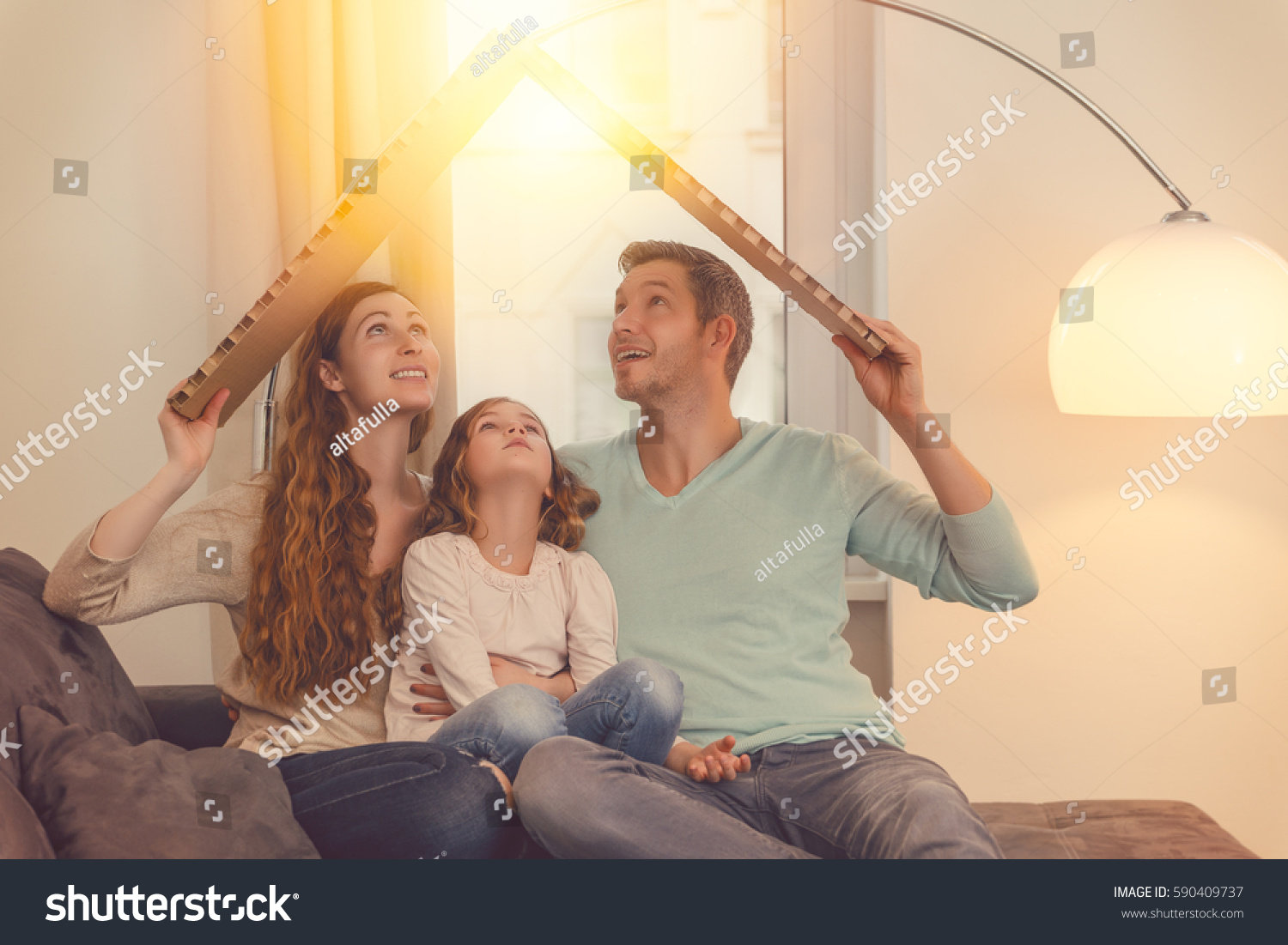 family in house planning with daughter #590409737