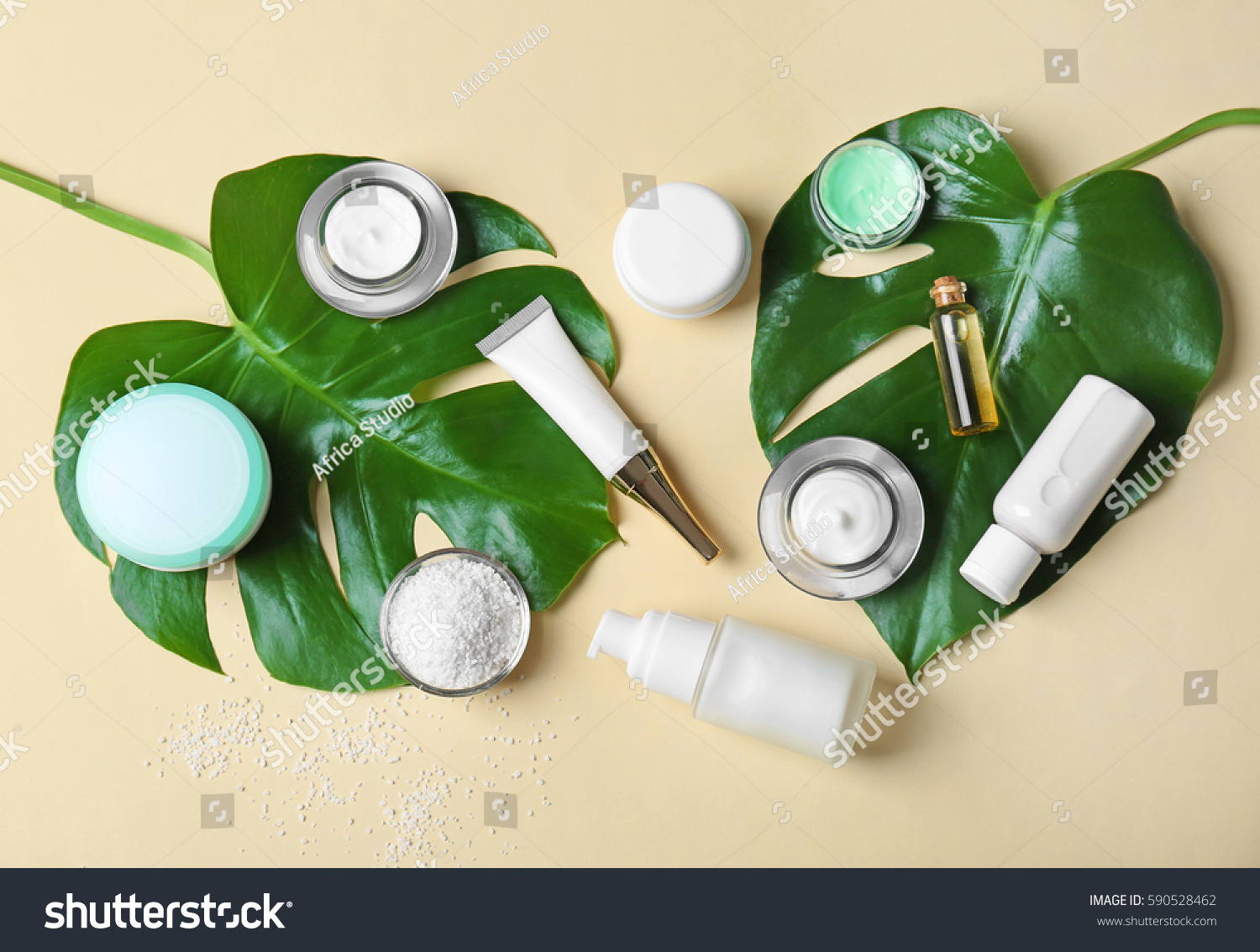 Natural cosmetics and leaves on light background #590528462