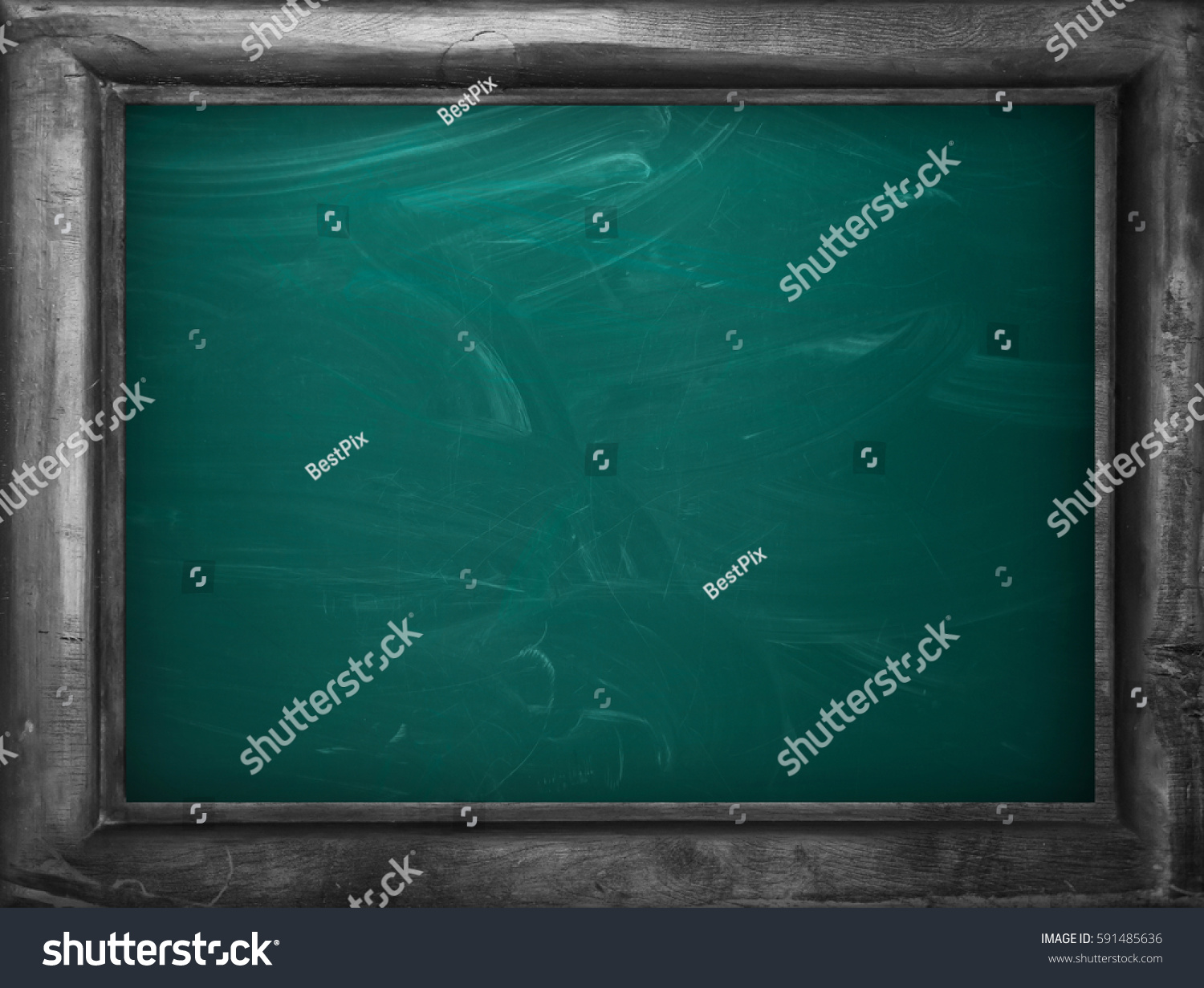Blackboard / chalkboard texture. Empty blank green chalkboard with chalk traces #591485636