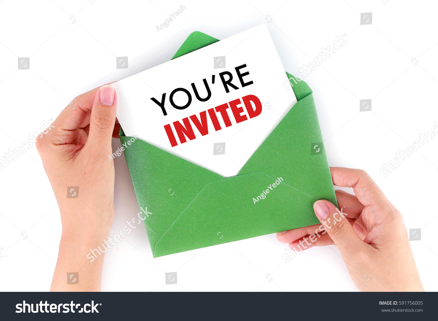 You're Invited Concepts - Hand holding a envelope and post card  #591756005