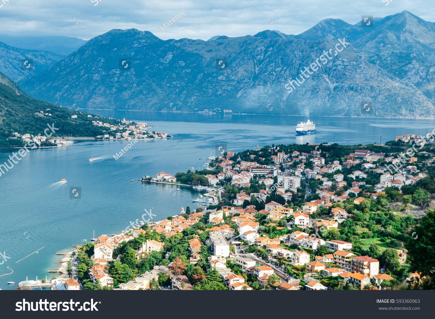 Panoramic view of port, town and mountains in Kotor, Montenegro #593360963