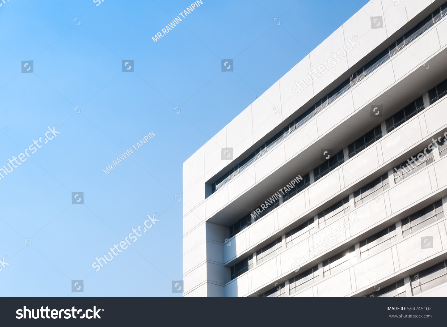 New building architecture on blue sky background,Low angle architectural exterior view of modern #594245102